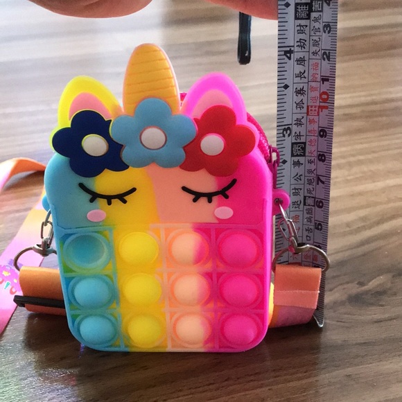 This are multiple pop toys for kids - Picture 4 of 5